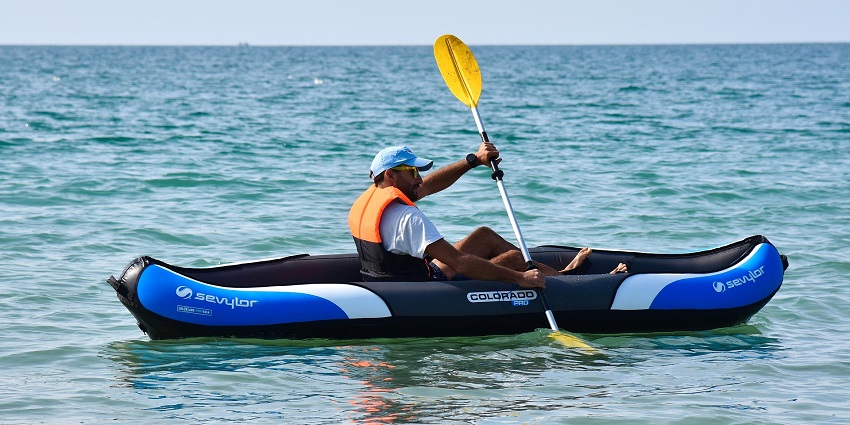 An image of a man kayaking in the waters, one of the best things to do in Negril.