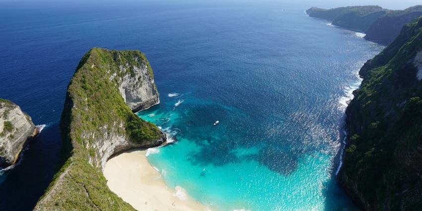 A peaceful black-sand beach known for surfing, sunsets, and scenic coastal beauty