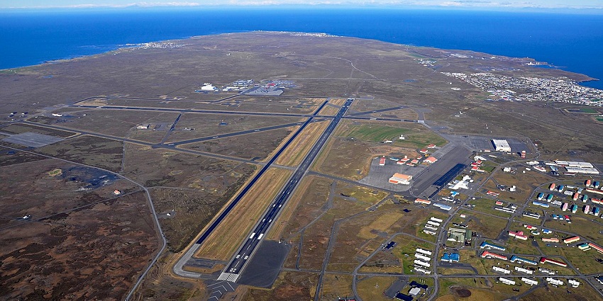 Aerial view of Keflavík International Airport, displaying its runways and landscape.