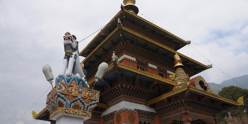 An image of the Bhutanese temple, Khamsum Yulley Namgyal Chorten, with tiered roofs