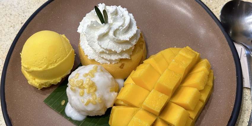 An image of a sweet mango with coconut-infused sticky rice, a Thai dessert favourite.