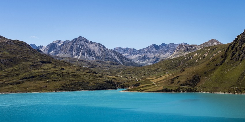 A peaceful lake surrounded by lush green beautiful mountain