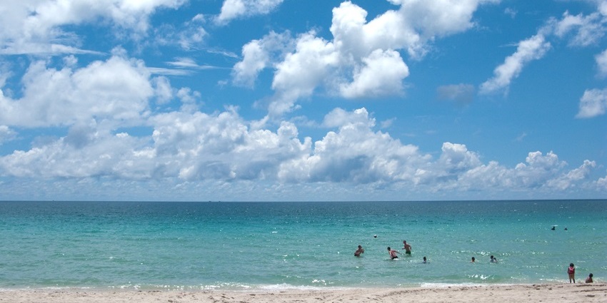Pristine blue beach of Koh Samui under a bright blue sky in Thailand, best places in July