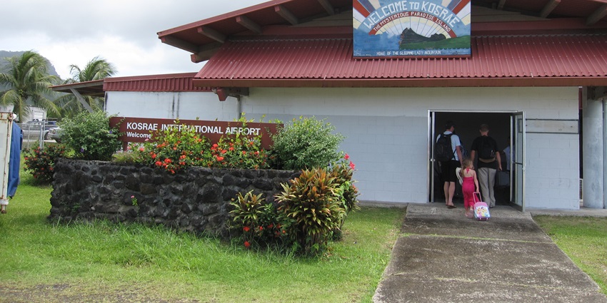 A group of tourists enter the small Kosrae International Airport in the Federated States of Micronesia.