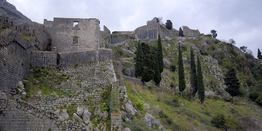 Ancient St. John’s Fort, amidst the greenery, reveals the heritage of the Kotor town