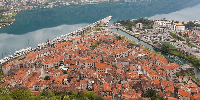 A coastal town with medieval architecture, a place to visit as per the Montenegro travel guide.