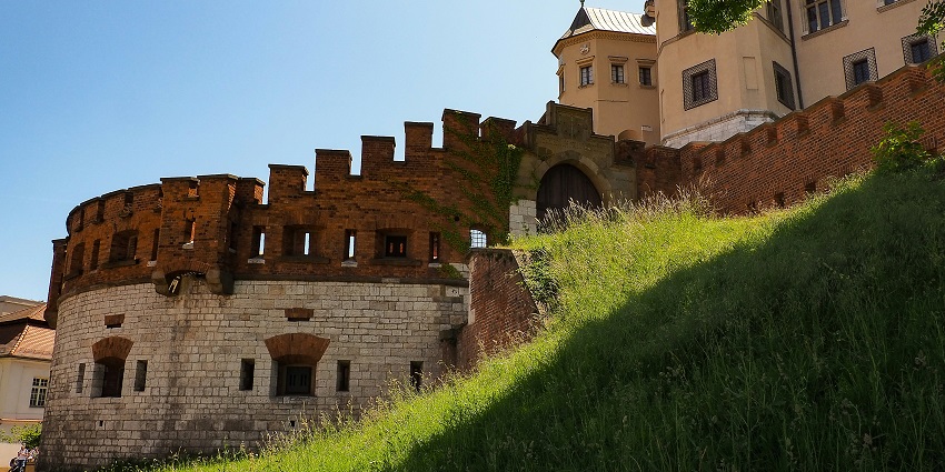 Image of Kraków Wawel Castle in Poland with stunning clear blue sky and architecture of the castle