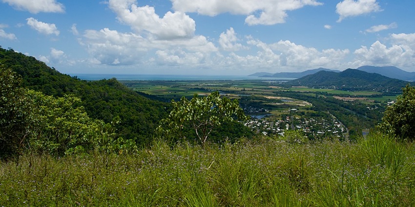 A scenic view of Kuranda Village with vibrant markets, tropical landscapes, and scenic views.