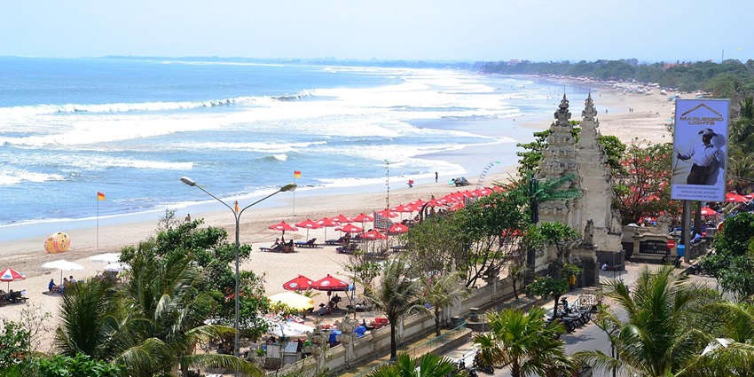 Discover a famous surf spot with lively vibes, among the best beaches in Seminyak, Bali.