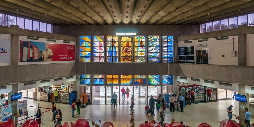 Passengers are walking inside La Chinita International Airport, one of the airports in Venezuela.