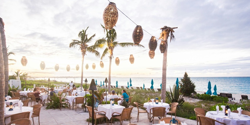 View of colorful bean bags, and delicious cocktails at La Plancha Bali.