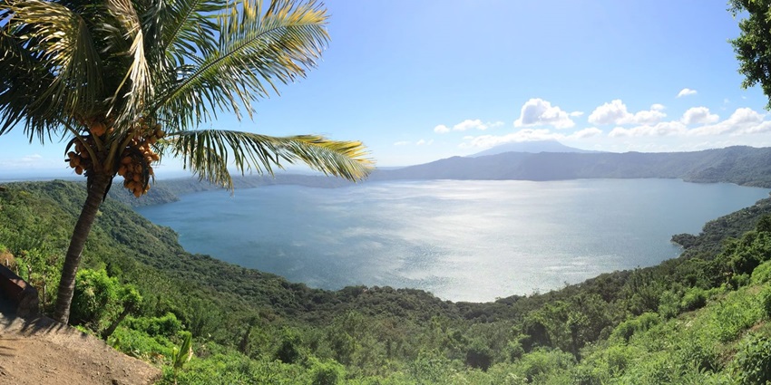 A crater lake in Nicaragua with crystal-clear waters, perfect for swimming and relaxing.