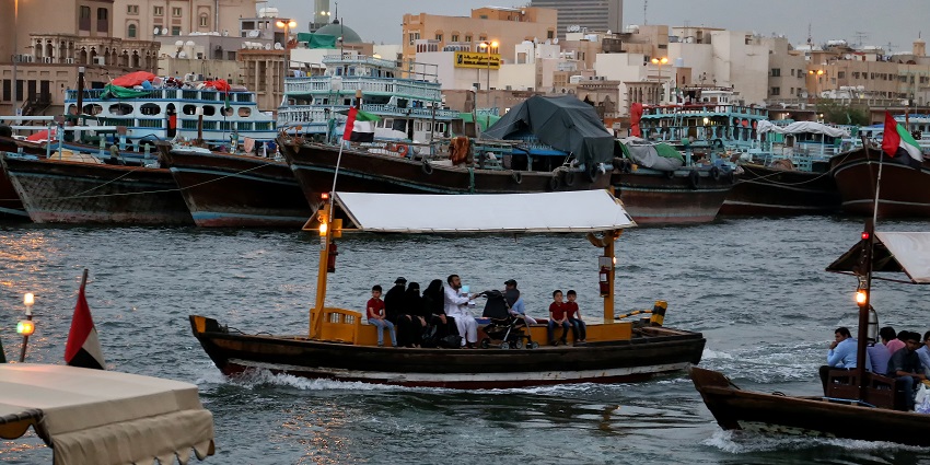 Glide across the water in a traditional wooden boat for an immersive experience in Dubai.