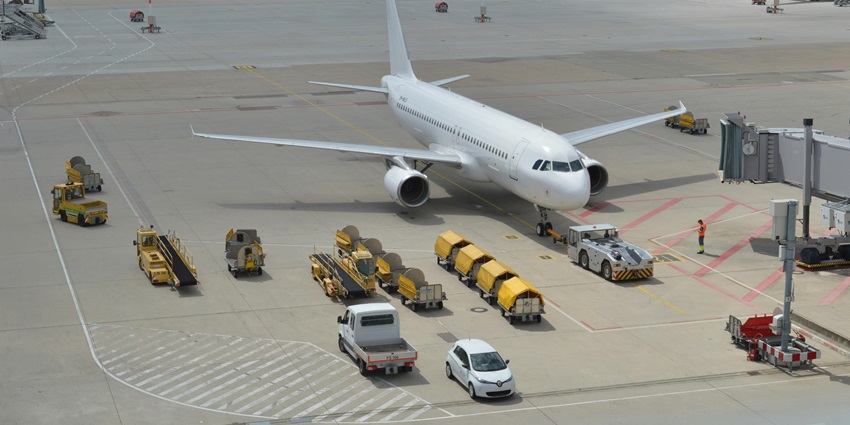 Travellers in front of the arrivals terminal at M. R. Štefánik Airport in Slovakia