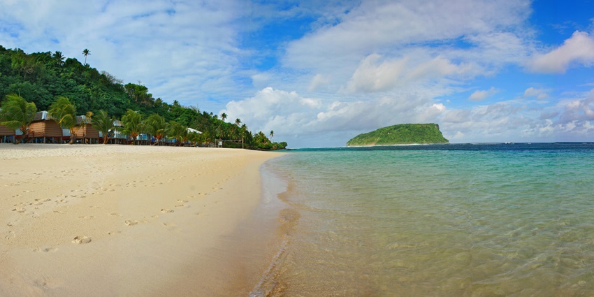 A scenic landscape of Lalomanu Beach, one of the places to visit on the Samoa Islands.