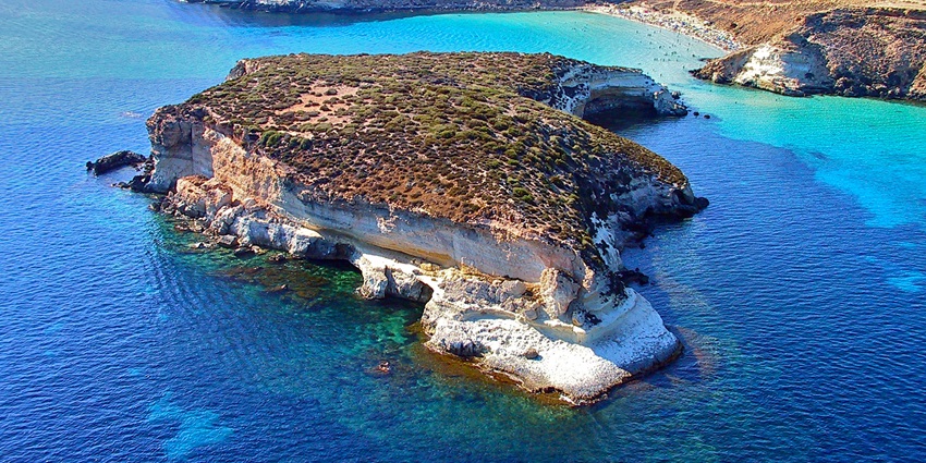 Lampedusa Island featuring turquoise waters, one of the islands in Italy for honeymoon.