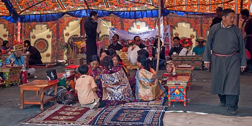 This is a picture of a Ladakhi cultural people gathering in traditional attire