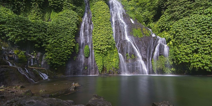 Lemukih Waterfall offers an adventurous trek through lush fields and forests to stunning, refreshing cascades.
