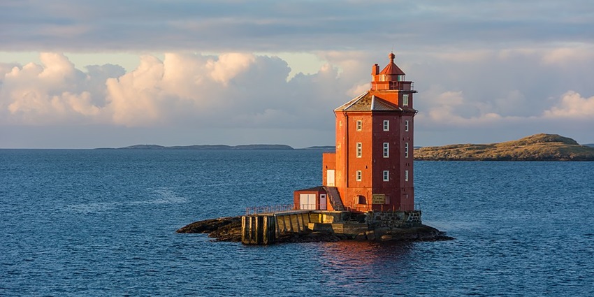 Admire breathtaking ocean views from the lighthouse at Pulau Lima
