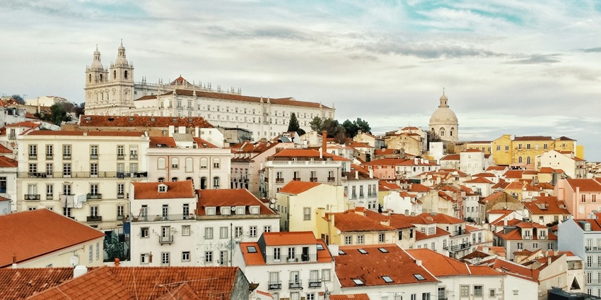 Experience colorful streets, historic trams, and breathtaking ocean views in Lisbon.