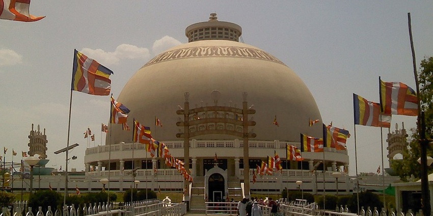 The lighthouse waterpark is in Maharashtra, surrounded by green trees and quiet nature.