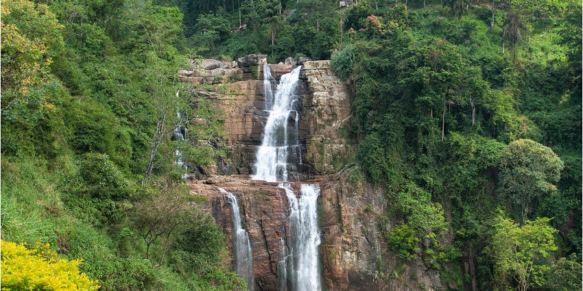 Breathtaking views of Ramboda Falls with its scenic surroundings.