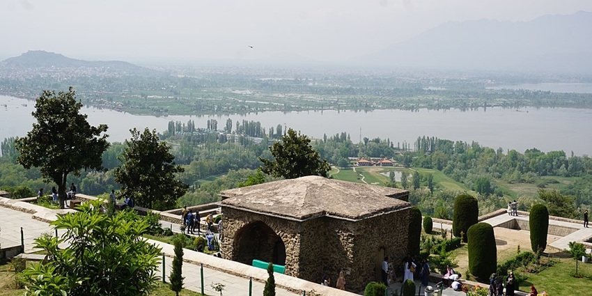 Dal Lake from Pari Mahal with a large water body, distant green shores and tall trees