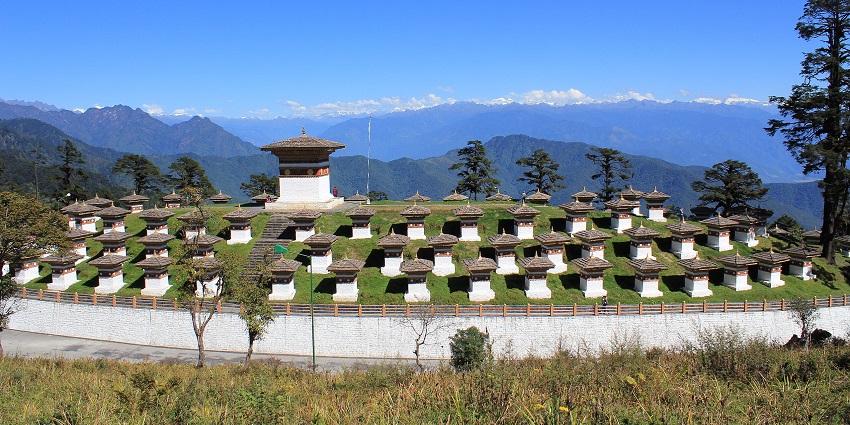 An image showing the 108 Chortens at Dochula Pass, arranged on a hill in Bhutan.