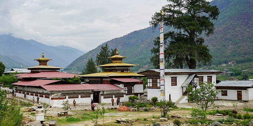 An image showing the ancient Kyichu Lhakhang temple with traditional Bhutanese architecture.