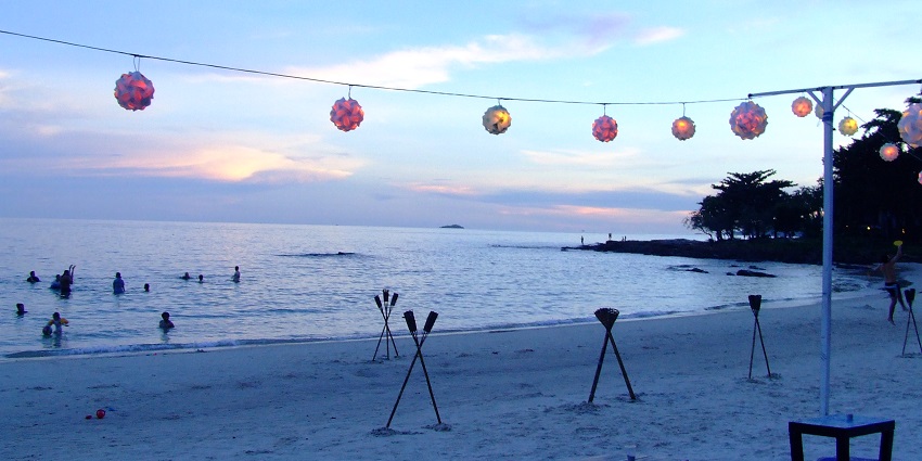 Scenic view of shores of Rayong crashing by waves, at the blue hour