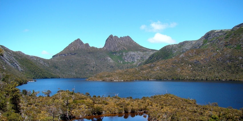 A picture of Cradle Mountain in Tasmania, Australia, reflecting in the tranquil Dove Lake.