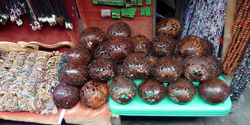 A photo of the Badung market in Bali, Indonesia, showing fresh yield and vibrant stalls filled with traditional items.