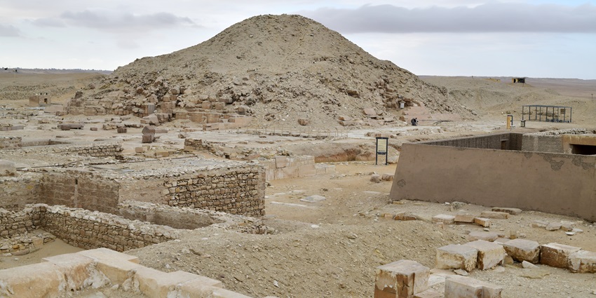 View of the Step Pyramid of Djoser, surrounded by sandy landscapes