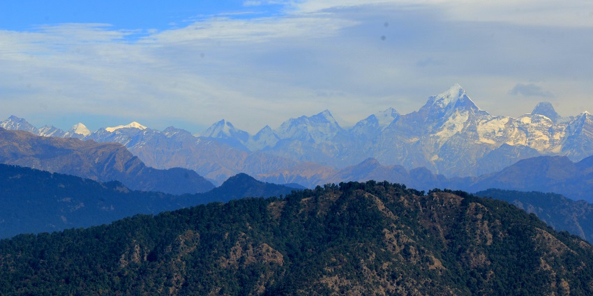 A panoramic view of the peaceful mountains where Dunagiri Temple is located.