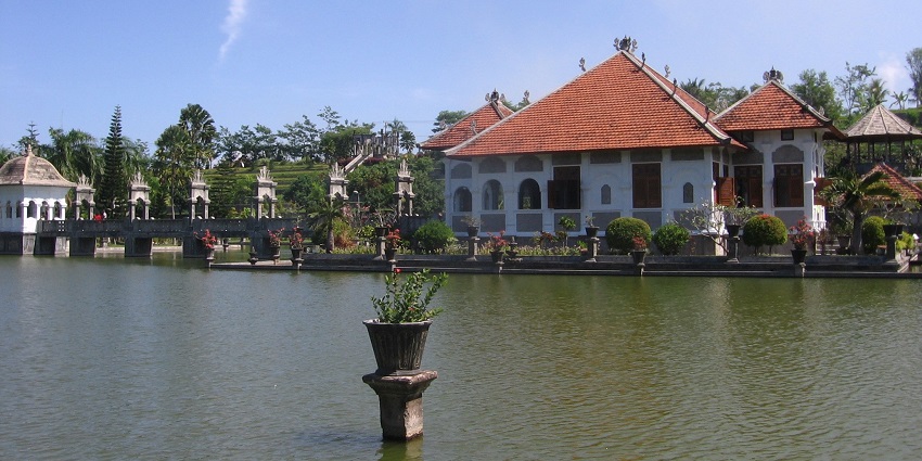 Image of Taman Ujung Water Palace in Bali, surrounded by a serene water body