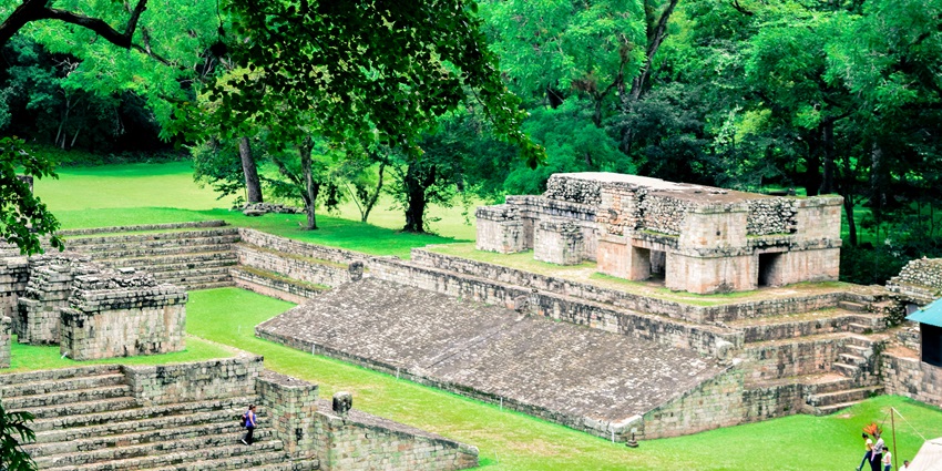 Explore Copán Ruinas, a Mayan archaeological site in Honduras with temples, and altars.