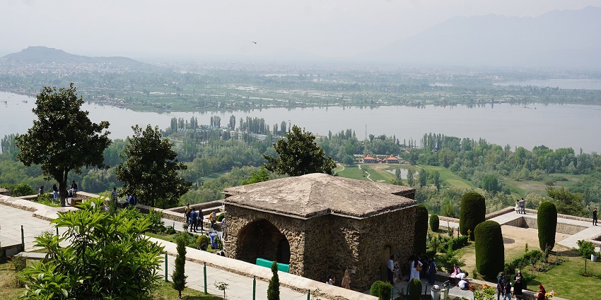 Dal Lake from Pari Mahal with a large water body, distant green shores and tall trees