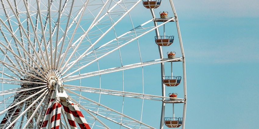 Ferris wheel at Him Valley Amusement & Cultural Park, offering panoramic views of Manali.
