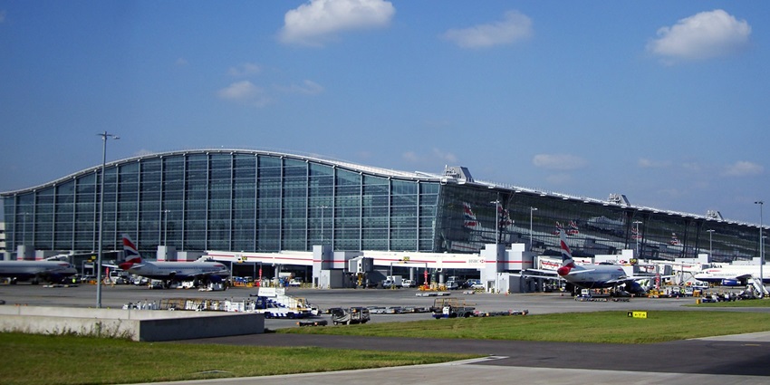 Exterior view of Terminal 5 at London Heathrow Airport, with flights parked at the gates