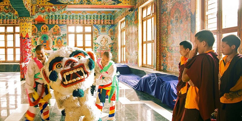 An image of the traditional masked dance performance at Losar festival, a famous festival in India