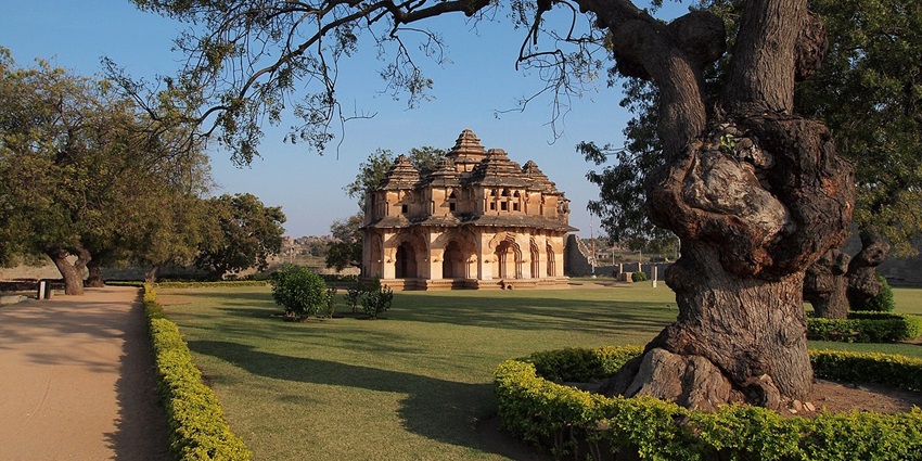 Beautiful park in front of the Lotus Mahal near Zenana Enclosure in Hampi, as described in this Hampi travel guide.