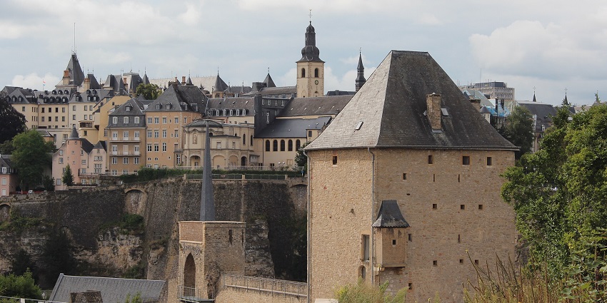 Old City showcases historic stone buildings, an old fort and church spires.
