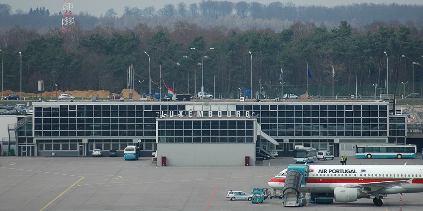 The Planes, airport buses and cars are operating at one of the airports in Luxembourg.