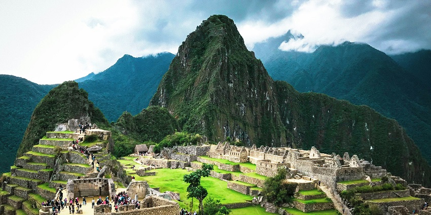 An ancient Incan citadel perched high in the Andes, showcasing archaeological ruins.