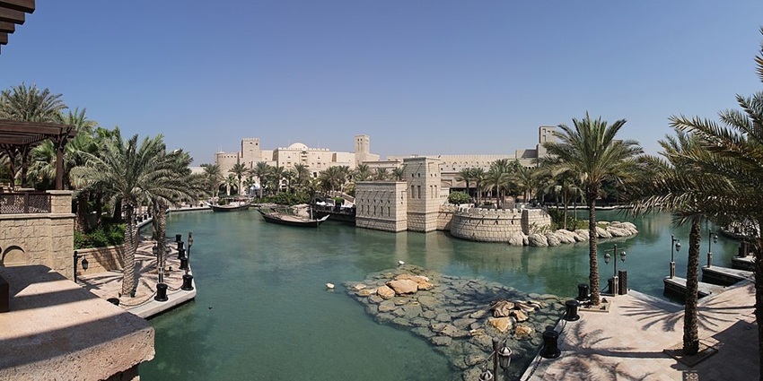 A luxurious Arabian-style resort with stunning waterfront views and traditional souks.