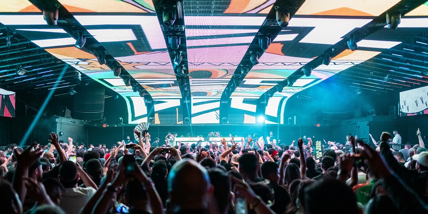 An image of Magnetic Fields Festival at Alsisar Palace, featuring a grand setup and electronic music.