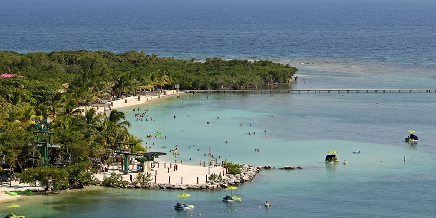 A stunning cruise port with private beach access, crystal-clear waters, and vibrant marine life.