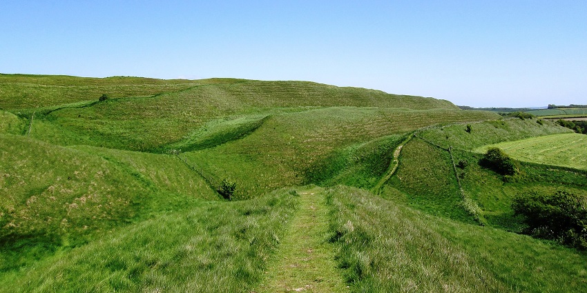 Maiden Castle is one of the largest and most fascinating hill forts in the United Kingdom!