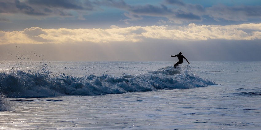 Experience riding the waves at Main Point Surf Spot, a place to visit in Arugam Bay.