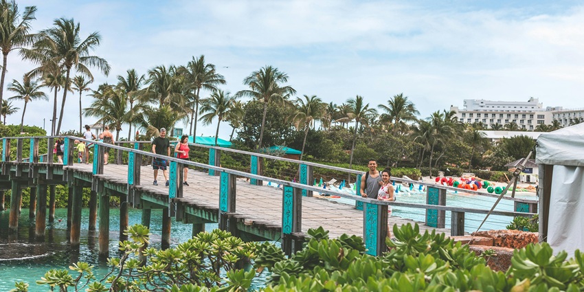 View of the Majuro Bridge, surrounded by palm trees, one of the popular places to visit on the Marshall Islands.
